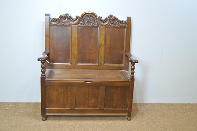 Lot 415 - Mid 20th C carved oak hall seat in the 17th C taste.
