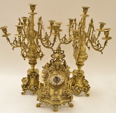 Lot 268 - Brass mantle clock and garnitures