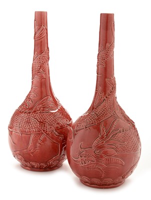 Lot 524 - Pair of Burmantofts art pottery bottle vases
