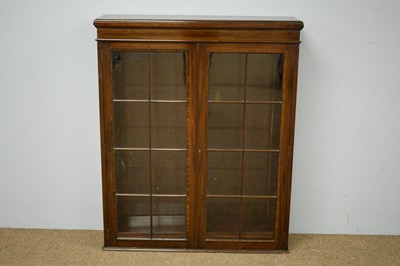 Lot 23 - 19th C mahogany and banded bookcase.