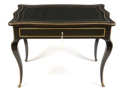 Lot 832 - Louis XV style ebonised bureau plat