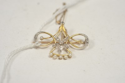 Lot 52 - An Edwardian diamond and seed pearl brooch.