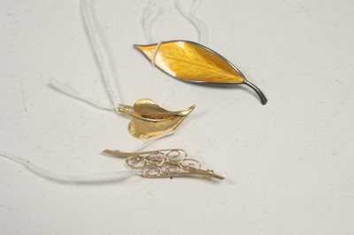 Lot 47 - Three brooches.