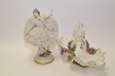 Lot 260 - A Continental figurine and a basket