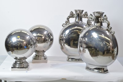 Lot 34 - Pair of silvered vases; and a pair of silvered ball ornaments.