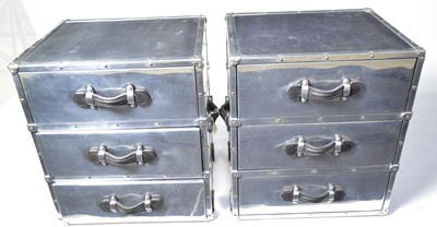 Lot 63 - Attributed to Andrew Martin: a pair of steel and leather chests.