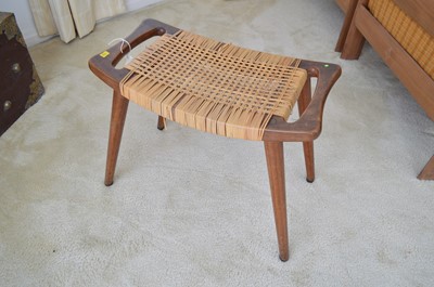 Lot 128 - A mid Century teak and woven stool.