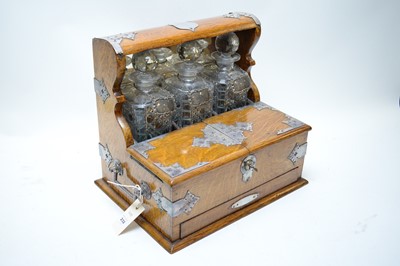 Lot 232 - An early 20th C tantalus.