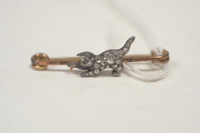 Lot 17 - A diamond set cat pattern bar brooch.