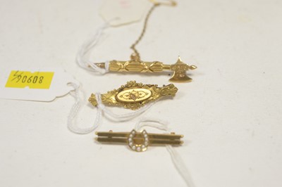 Lot 249A - Three yellow metal brooches.