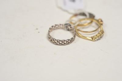 Lot 42 - Four rings.