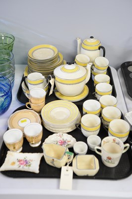 Lot 315 - A Foley china yellow and black coloured tea service.