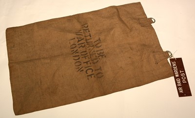 Lot 1118 - WWII Air Raid Wardens Post label; and a War Office mailbag.