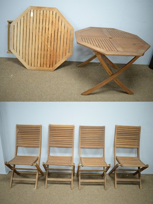 Lot 90 - 20th Century teak garden table and four chairs