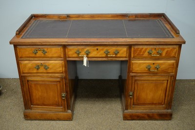 Lot 27 - A walnut pedestal desk