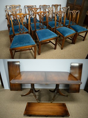 Lot 88 - Chapmans: twelve chairs and a twin pedestal dining table.