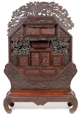 Lot 847 - A Japanese carved netsuke display cabinet.