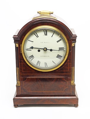 Lot 760 - A Regency mahogany mantel clock.