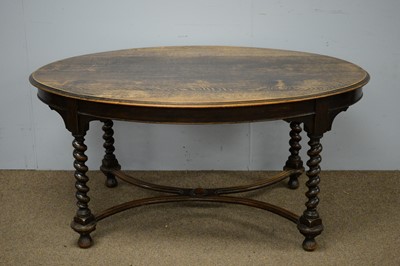 Lot 65 - 1920's oak oval dining table.