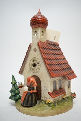 Lot 373 - A clock group 'The Love Lives On'.