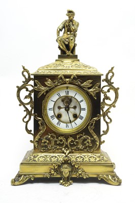 Lot 762 - An early 20th C brass-cased mantel clock.
