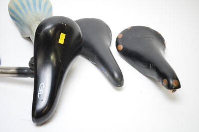 Lot 729 - A Brooks Professional saddle; and five others.