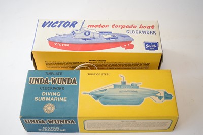 Lot 858 - Sutcliffe tinplate clockwork models.