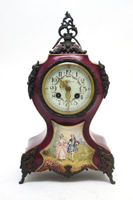 Lot 763 - A 19th C French porcelain mantel clock.