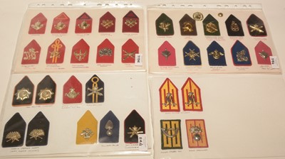 Lot 1194 - A collection of 33 Dutch collar badges on boards.