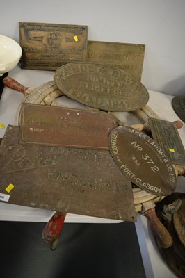 Lot 288 - A collection of ship builders plaques and a ship's wheel