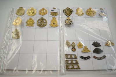 Lot 1223 - A collection of 26 Australian metal cap badges.