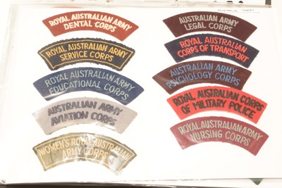 Lot 1240 - A collection of 105 Australian cloth shoulder titles.