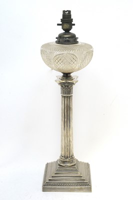 Lot 147 - A late Victorian silver oil lamp.