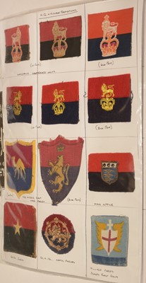 Lot 1252 - A collection of approximately 140 WWII Military cloth badges.