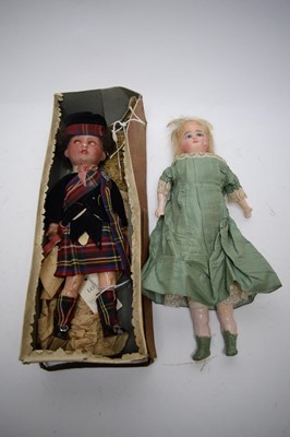 Lot 779 - Two dolls.