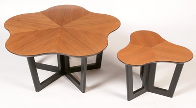 Lot 831 - A set of two Heal's style teak and ebonised tables.