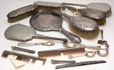Lot 247 - A selection of silver-backed dressing table items