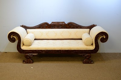 Lot 10 - A Regency style sofa.