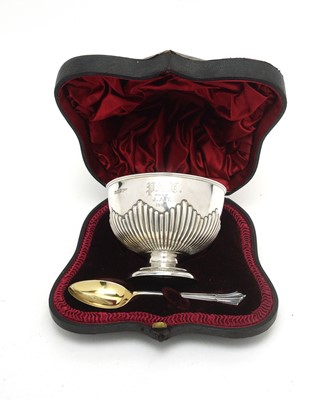 Lot 165 - An Edwardian silver sugar bowl and spoon.