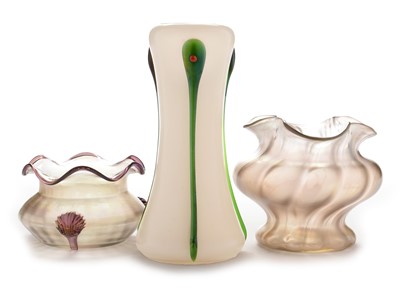 Lot 602 - Two iridescent glass vases and another