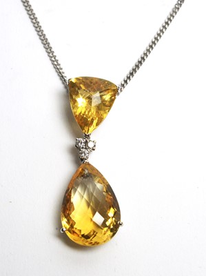 Lot 15 - A citrine and diamond drop pendant