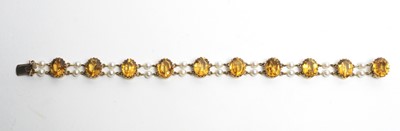 Lot 38 - A citrine and pearl bracelet