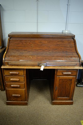 Lot 108 - Early 20th C oak roll top desk.