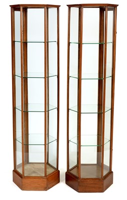 Lot 862 - Pair of Edwardian oak hexagonal display cabinets