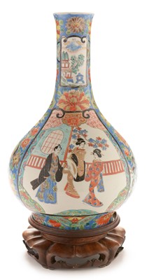 Lot 488 - Japanese bottle vase and wood stand