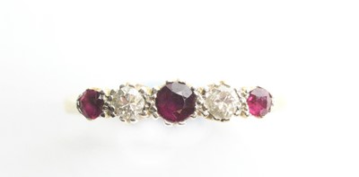Lot 14 - A ruby and diamond ring