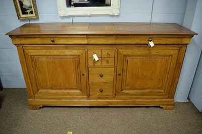 Lot 100 - 20th C oak sideboard.