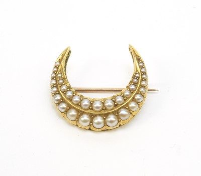 Lot 76 - A pearl ser crescent brooch