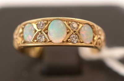 Lot 173 - Opal and diamond ring
