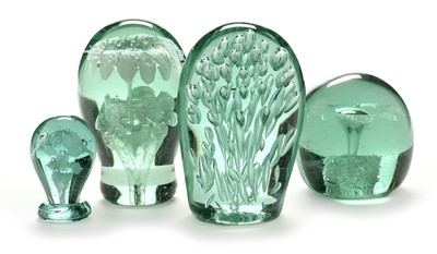 Lot 573 - Four green glass dumps